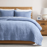 WDCOZY blue twin quilt top view highlights lightweight, breathable fabric for all-season comfort.
