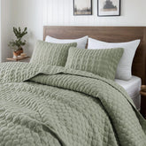 WDCOZY oversized California King quilt in sage green draped on bed for all season comfort