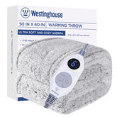 Westinghouse Electric Blanket Throw on sofa delivers cozy warmth for evenings.