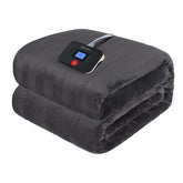 Westinghouse electric blanket twin on bed in charcoal delivers cozy warmth for chilly nights.