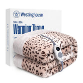 Westinghouse Leopard heated throw on sofa delivers cozy warmth