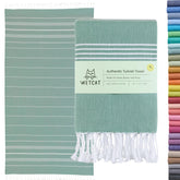 Wetcat Turkish beach towel oversized teal folded for travel convenience