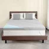 WEUP extra firm topper on bed for enhanced spinal support and stability.