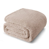 Whale Flotilla king-size blanket folded on a bed offering cozy warmth.