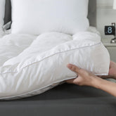 WhatsBedding 5in memory foam topper soft cover close-up for breathable comfort.