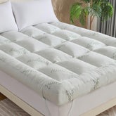 WhatsBedding 5 inch memory foam topper on queen bed surface for added comfort