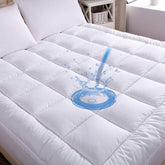 WhatsBedding mattress pad on bed enhances sleep comfort and protects your mattress.