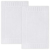 White Classic bath mat showing plush absorbent cotton for quick drying.