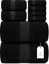 White Classic luxury bath towel set on rack; plush and absorbent.