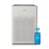 Winix AM90 front view in a large room showing clean air potential