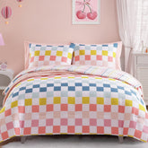 Wink Deer twin comforter set with colorful checkered pattern enhances a girl's playful bedroom.