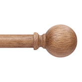 Wolistsa wood curtain rod front view with decorative finials for boho style.