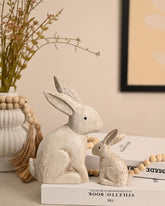 Two wooden Easter bunny figurines by WONDROUS' DECO for timeless farmhouse table decor