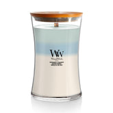 WoodWick Oceanic Trilogy hourglass candle pour reveals layered scents in a premium soy-paraffin blend