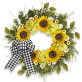 Worthyeah sunflower wreath on front door welcomes guests.