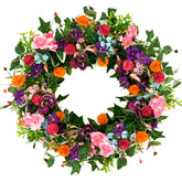 WreathDream front door pansy wreath enhances spring entryway curb appeal.