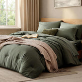 WRENSONGE olive-green comforter set pack shot showing seven pieces for a coordinated look.