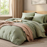 WRENSONGE sage green full-size comforter folded, soft and inviting
