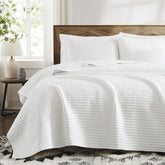 WRENSONGE white king quilt with square pattern for a refined bedroom look.