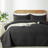 WURUIBO full-queen quilt black with ultrasonic embossing for durable style.