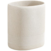 WUUAHOME oval beige trash can with stone-look finish for stylish bathroom waste disposal.