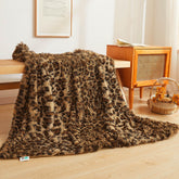 XeGe luxury leopard throw on sofa, warm and plush