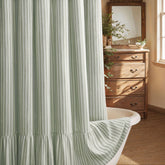 XOGUIBO farmhouse shower curtain with stripe pattern enhances cozy rustic bathroom aesthetics.