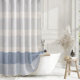 XOGUIBO light blue shower curtain highlights a linen texture for a soft, relaxing bathroom feel.