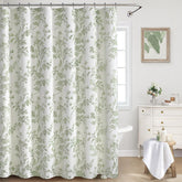 XOGUIBO sage green floral curtain pattern enhances a calm cottagecore bathroom.