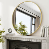 XRAMFY 36-inch round mirror with matte gold frame adds modern elegance to any wall.