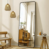 XRAMFY full-length mirror with stand for full-body viewing in a sleek black frame.