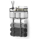 Xstydes black wall-mounted towel rack with storage basket for organized towels.