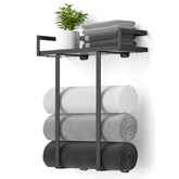 Xstydes wall-mounted towel rack in black for compact bathroom space