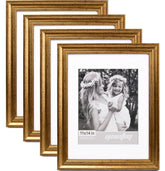 Yaetm 11x14 gold frame with mat surrounds an 8x10 photo for wall display.