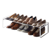 Yamazaki Home Frame shoe rack side view for compact organization.