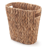 YangqiHome handwoven wicker bathroom trash can seen in a modern bathroom.