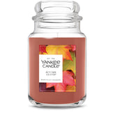 Yankee Candle Autumn Leaves jar front view emitting warm autumn ambiance
