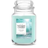 Yankee Candle Catching Rays jar front view with warm orange and amber notes.