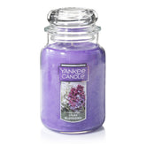 Yankee Candle Lilac Blossoms 22oz jar displays lilac scent for a fresh room ambiance.