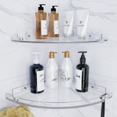 YAWSOUP acrylic corner shelves are mounted on tile for organized bathroom storage.