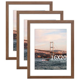 YESKAY 16x20 wooden frame with mat displaying an 11x14 photo on the wall.