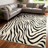 YIHOUSE 5x7 zebra-abstract rug in black and cream, ideal for chic living rooms