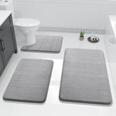 Yimobra memory foam bath mat surface in gray with plush, quick-drying comfort.