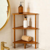Yoshiky bamboo corner shower shelf blends into a bathroom corner for space-saving storage