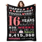 YPURTSD Sweet 16 gift blanket on bed, cozy birthday keepsake.