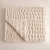 YUSOKI luxury double-side faux rabbit fur throw on a stylish sofa for cozy decor.
