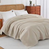 Zaizaihome waffle throw close-up reveals breathable cotton weave for all-season comfort.