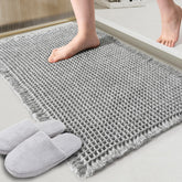 ZALL grey waffle bath mat with 24x36 size for dry floors.