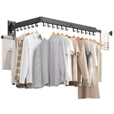 ZdwCyl wall-mounted clothes hanger folds left for space-saving design.