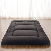 Zelladorra Japanese Floor Mattress folded in storage bag for easy transport